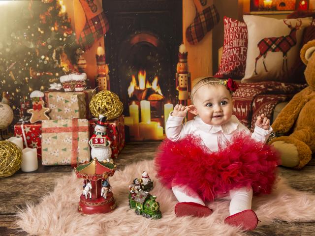 Pourquoi offrir un shooting photo de bébé pour Noël ?