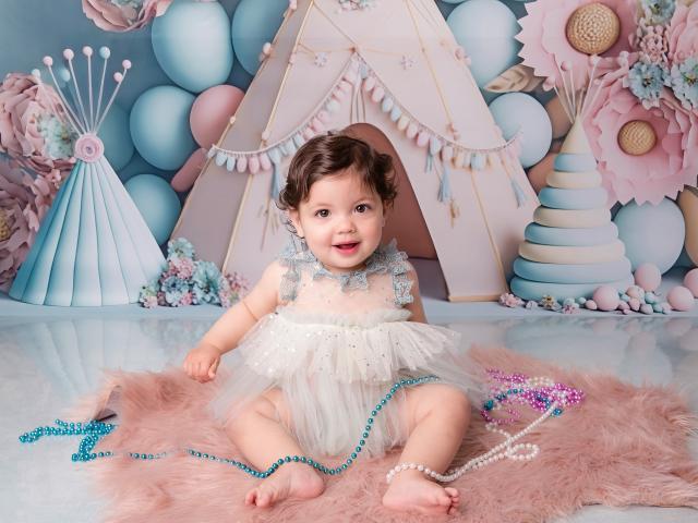 Comment réussir votre shooting bébé 6 mois en extérieur ?